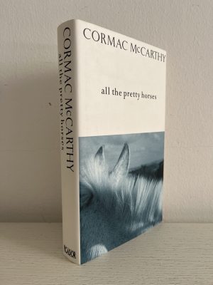 ALL THE PRETTY HORSES, FIRST ENGLISH EDITION: A SCARCE INSCRIBED COPY